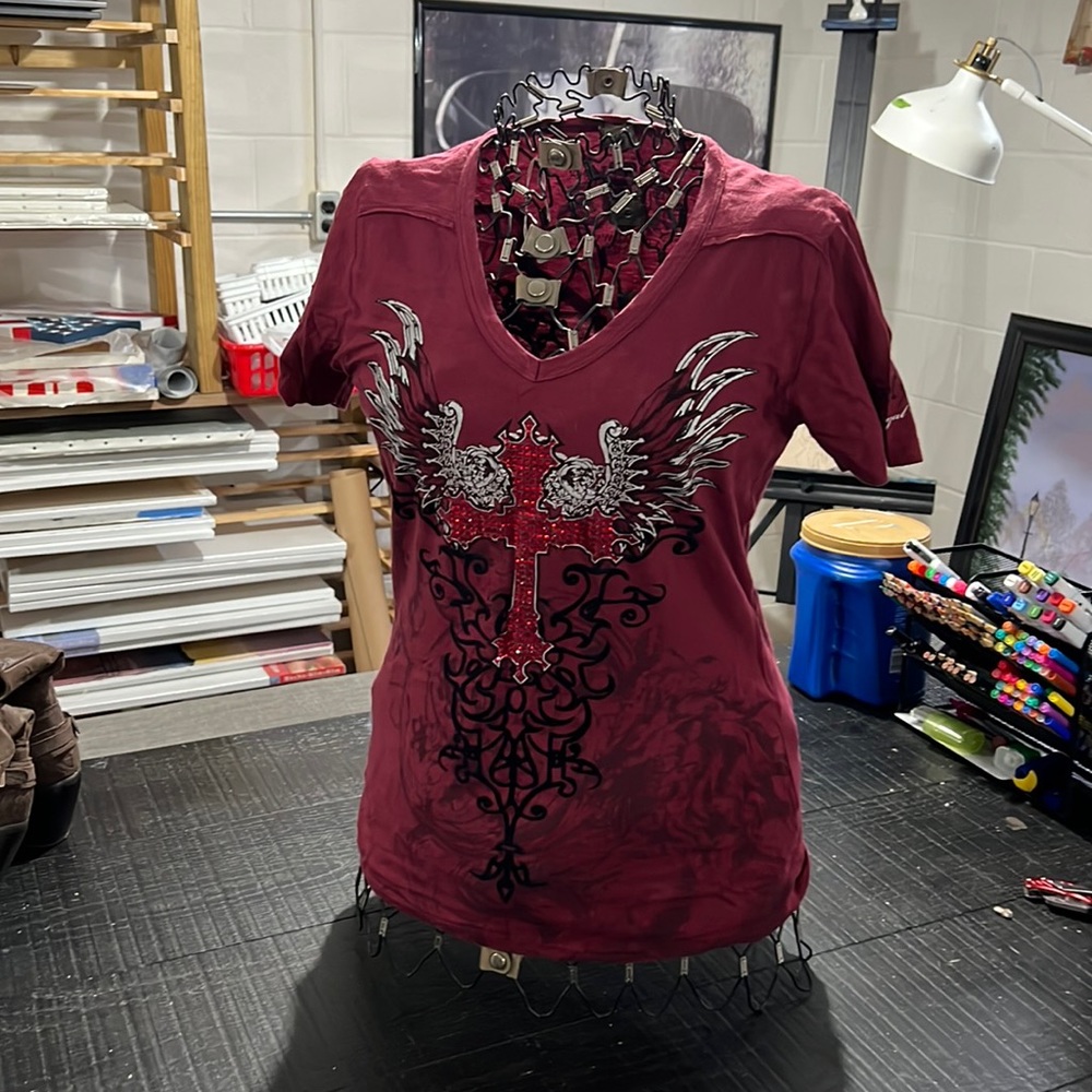 Rebel Spirit women’s t-shirt.  Very cute and gentle used and well cared for.